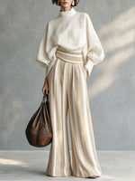 Stylish Casual Two-piece Set Featuring A Linen-cotton Blend Top And Striped Wide-leg Trousers.