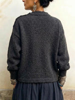 Knitted Sweater With An Asymmetrical, Overlapping, Button-fastened Hem