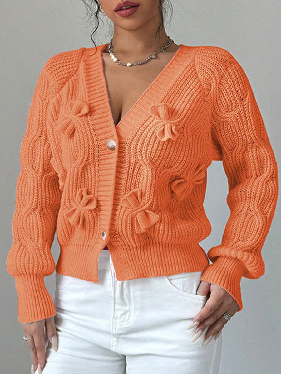 Cozy and casual cable-knit cardigan with 3D bow detail
