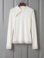 Long-sleeved, Slim-fit Top Featuring A Stand Collar, Traditional Chinese-style Knotted Buttons (pankou), Cut-out Details, And Lace Panels